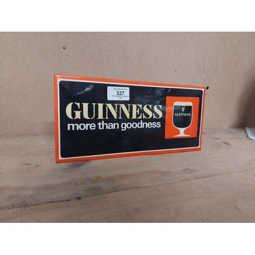 327 - Guinness More Than Goodness celluloid shelf sign. {13 cm H x 28 cm W}.