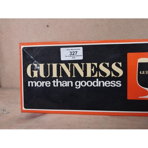 327 - Guinness More Than Goodness celluloid shelf sign. {13 cm H x 28 cm W}.