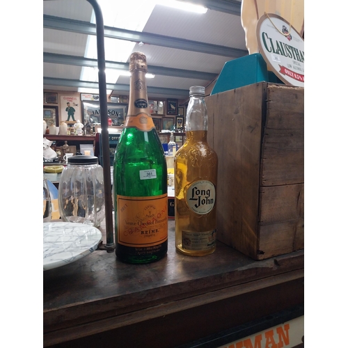 361 - Long John Whiskey bottle and Veuve Clicquot champagne bottle. {50 cm H x 12 cm Dia} and {42 cm H x 1... 