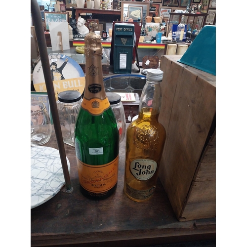 361 - Long John Whiskey bottle and Veuve Clicquot champagne bottle. {50 cm H x 12 cm Dia} and {42 cm H x 1... 