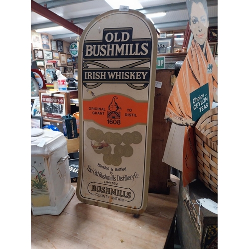 380 - Bushmills Irish Whiskey cardboard advertising sign. {77 cm H x 30 cm W].