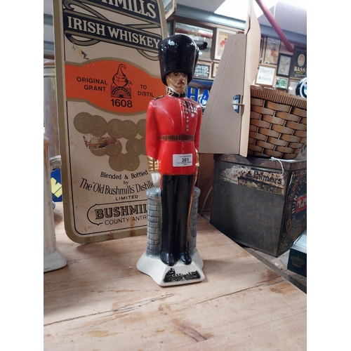 381 - Canadian Whiskey bottle in form of a Grenadier Guard. {42 cm H x 13 cm W x 10 cm D}.