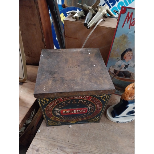 387 - Huntley and Palmers Biscuits lidded advertising tin. {34 cm H x 34 cm W x 34 cm D}.