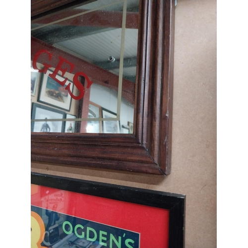 39 - Framed Carriages advertising mirror. {31 cm H x 64 cm W}.