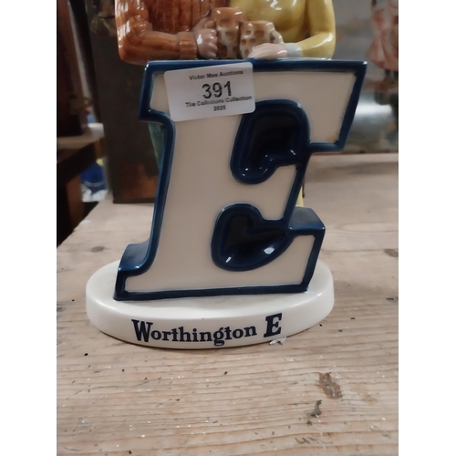 391 - Worthington's E Bitter Beswick advertising figure. [23 cm H x 15 cm W x 10 cm D}.