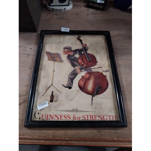 393 - Guinness for Strength framed showcard. {43 cm H x 23 cm W].