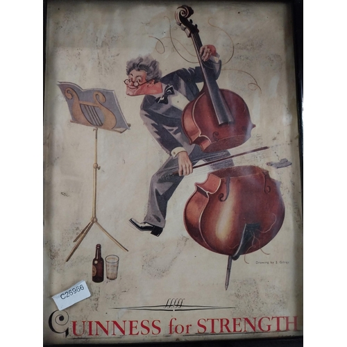 393 - Guinness for Strength framed showcard. {43 cm H x 23 cm W].