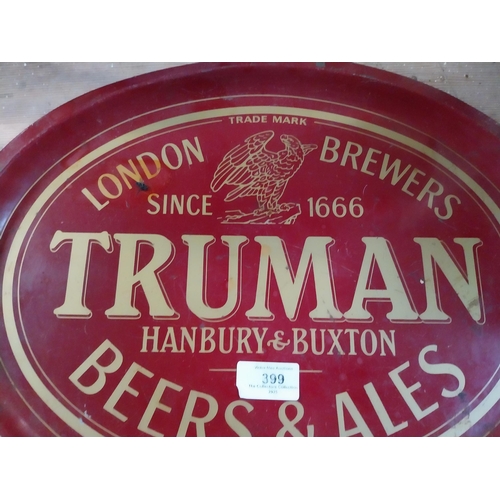 399 - Trumans Beer and Ales tin plate advertising tray. {3 cm H x 31 cm Dia.}.