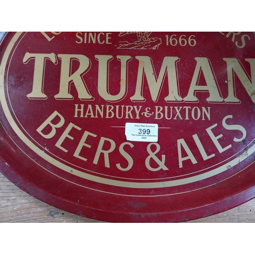 399 - Trumans Beer and Ales tin plate advertising tray. {3 cm H x 31 cm Dia.}.