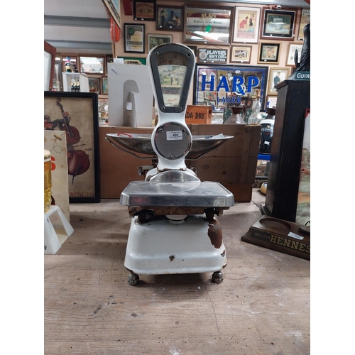 402 - 1940's enamel and chrome shop scales. {64 cm H x 56 cm W x 43 cm D}