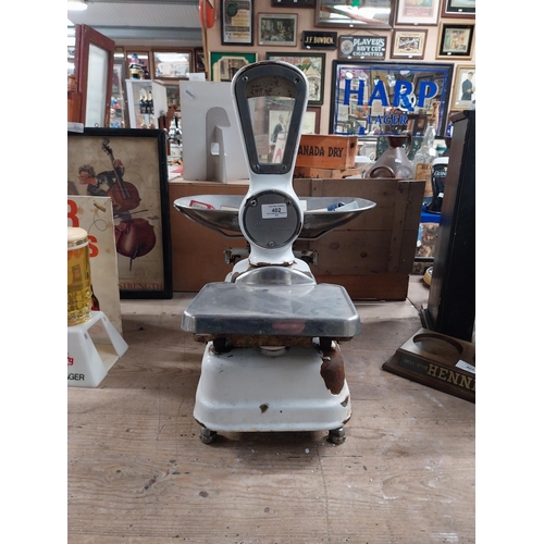 402 - 1940's enamel and chrome shop scales. {64 cm H x 56 cm W x 43 cm D}