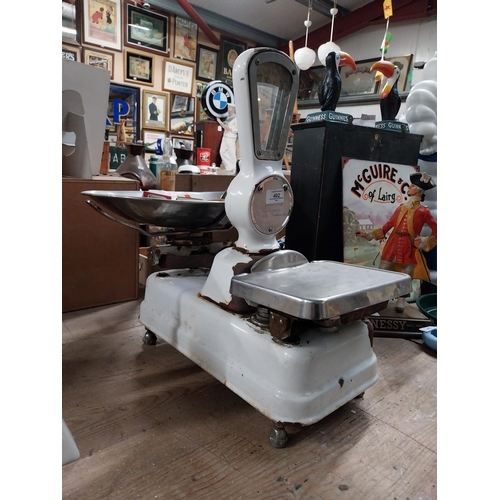 402 - 1940's enamel and chrome shop scales. {64 cm H x 56 cm W x 43 cm D}