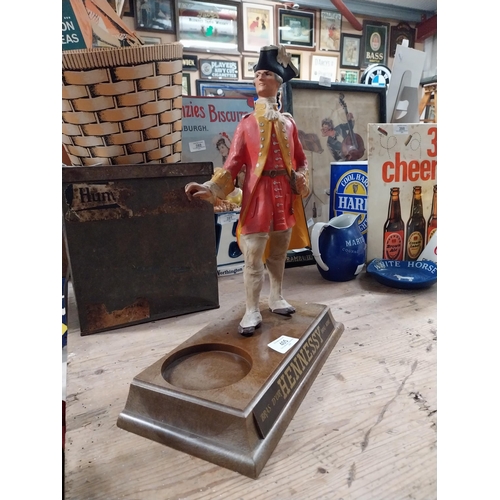 405 - Rare Hennessy Cognac advertising figure. {38 cm H x 30 cm W x 15 cm D}.