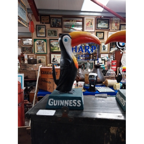 407 - Pair of Guinness cast iron Toucans. {40 cm H x 13 cm W x 8 cm D}.