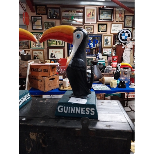 407 - Pair of Guinness cast iron Toucans. {40 cm H x 13 cm W x 8 cm D}.