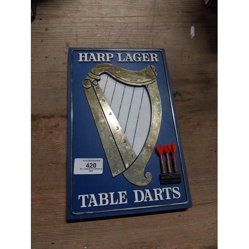 420 - Harp Lager table darts set. { 26cm H X 16cm W }.