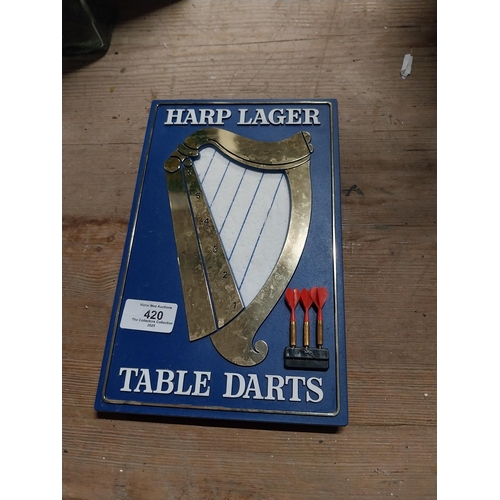 420 - Harp Lager table darts set. { 26cm H X 16cm W }.