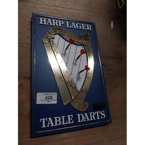 420 - Harp Lager table darts set. { 26cm H X 16cm W }.