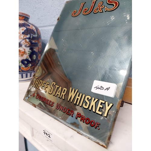 420A - John Jameson Three Star Whiskey advertising mirror. {31 cm H x 23 cm W}.