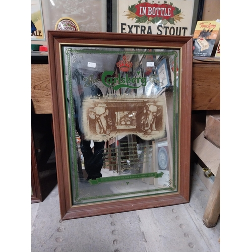 432 - Framed Carlsberg advertising mirror.{91 cm H x 71 cm W}.