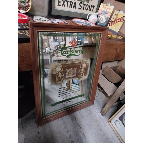 432 - Framed Carlsberg advertising mirror.{91 cm H x 71 cm W}.