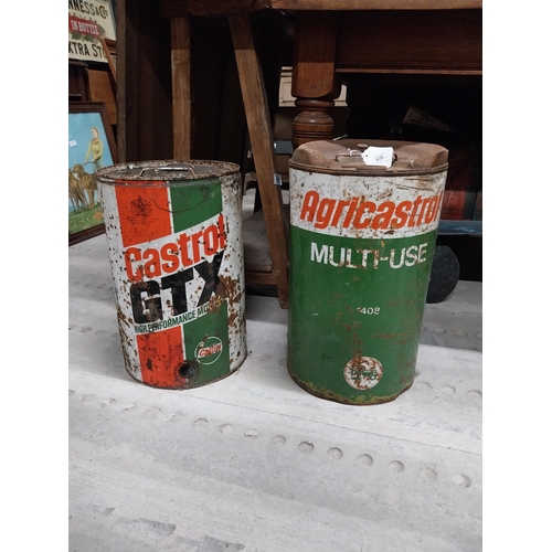 436 - Two Castrol oil drums - Castrol GTX and Agricastrol Multiuse. {46 cm H x 29 cm Diam.}.