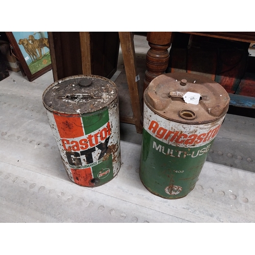 436 - Two Castrol oil drums - Castrol GTX and Agricastrol Multiuse. {46 cm H x 29 cm Diam.}.