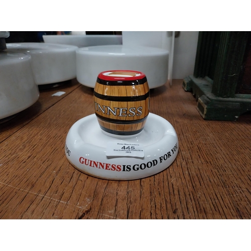 445 - Guinness ceramic advertising matchstrike. {9 cm H x 15 cm Diam.}.