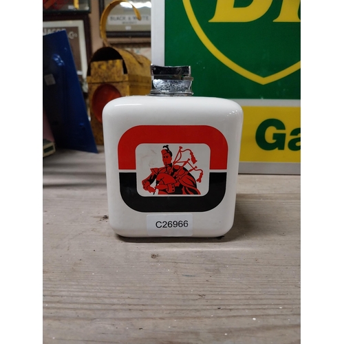 450 - Ceramic Piper Export lighter. {14 cm H x 10 cm W x 10 cm D}.