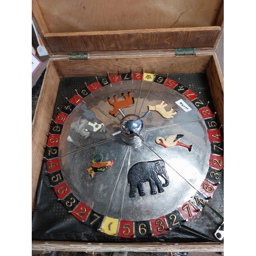 455A - Cased Roulette wheel. {12 cm H x 33 cm W x 33 cm D}.