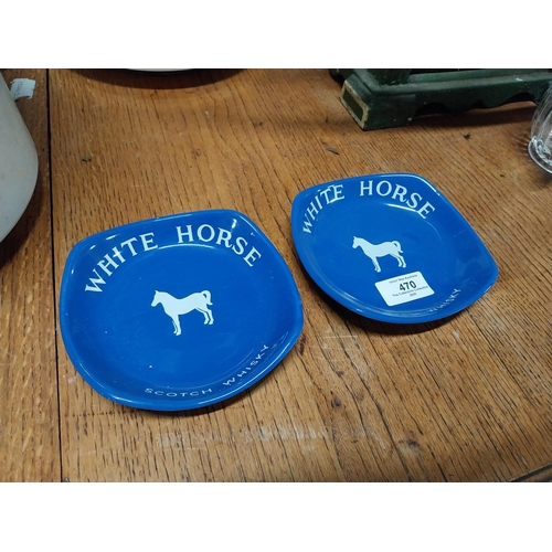 470 - Two White Horse Scotch Whiskey Wade ceramice advertising ashtrays. {3 cm H x 14 cm W x 14 cm D}.