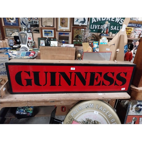 472 - Guinness light up advertising sign. {21 cm H x 117 cm W x 13 cm D}.