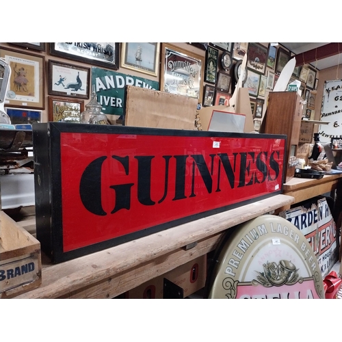 472 - Guinness light up advertising sign. {21 cm H x 117 cm W x 13 cm D}.