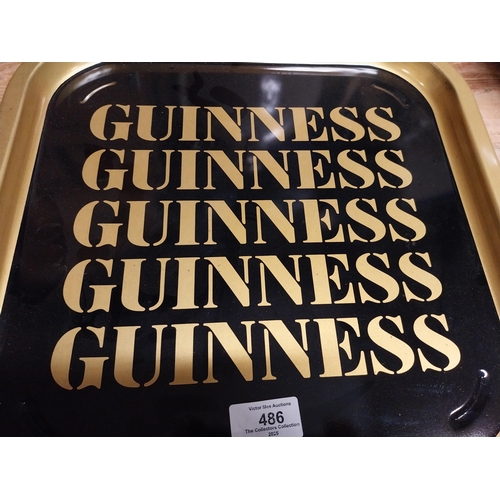 486 - Guinness tin plate drink's tray. {2 cm H x 35 cm W}.