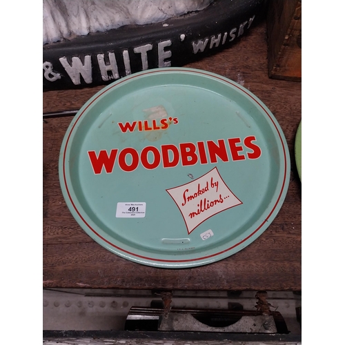 491 - Wills's Woodbine tin plate drink's tray. {2 cm H x 32 cm Dia.}.