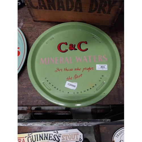 493 - C and C Mineral Waters tin plate drink's tray. {2 cm H x 32 cm Dia.}.