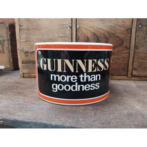 499 - Guinness ceramic change tray. {9 cm H x 14 cm Dia.} and Murphy's Irish Stout change tray. {4 cm H x ... 