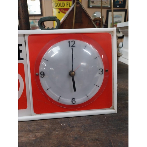 508 - There's a Whole World in a Guinness perspex advertising Clock. {15 cm H x 31 cm W x 7 cm D}.