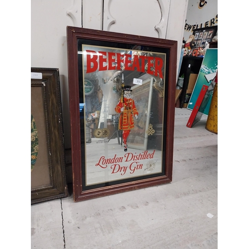 513 - Framed Beefeater London Dry Gin advertising mirror. {64 cm H x 36 cm W}.