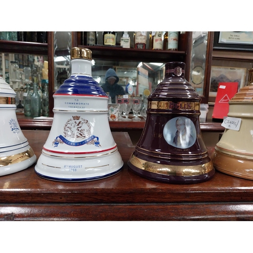 527 - Twelve Bells Scotch Whiskey ceramic advertising bells. {19 cm H x 13 cm Dia to 14 cm H x 5 cm Dia.}.