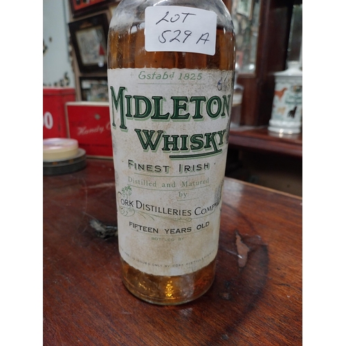 529A - Bottle of Middleton Cork Distillers 15 year old Irish Whiskey. {31 cm H x 9 cm Dia.}.