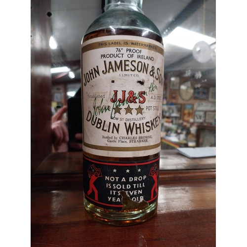 532 - Bottle of John Jameson Dublin Irish Whiskey  Not a Drop sold til its seven years old label attached.