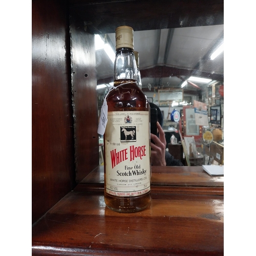 533 - Bottle of White Horse Scotch Whiskey.