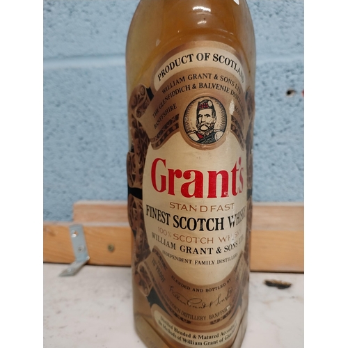 533A - Grant's Finest Scotch Whiskey. {29 cm H x 8 cm Dia.}.