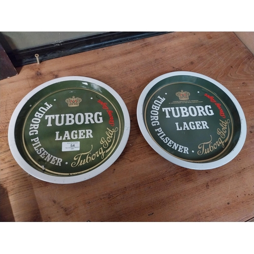 54 - Two Tuborg Lager tin  plate drinks tray. {27 cm Dia}.