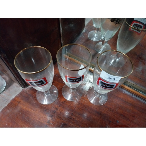 543 - Three Carling Black Label glasses. {17 cm H x 8 cm Dia.} and Three Celebration Ale glasses. {12 cm H... 