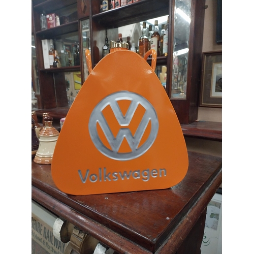 554 - Volkswagon metal oil can. {33 cm H x 31 cm W x 11 cm D}.