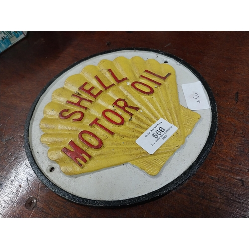 556 - Shell Motor Oil cast iron wall plaque. {21 cm H x 21 cm W}.