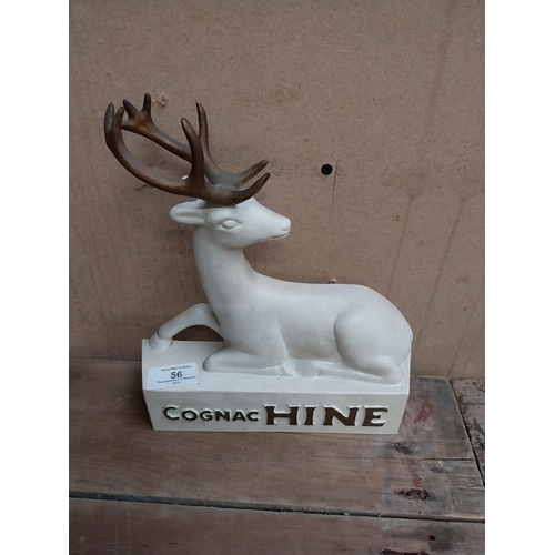 56 - Cognac Hine Ruberoid advertising figure. {25 cm H x 22 cm W x 6 cm D}.