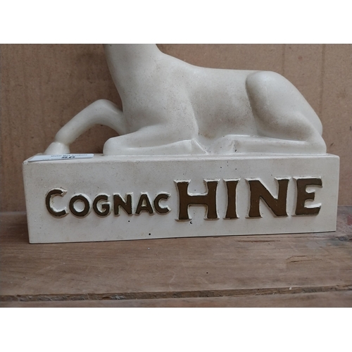 56 - Cognac Hine Ruberoid advertising figure. {25 cm H x 22 cm W x 6 cm D}.